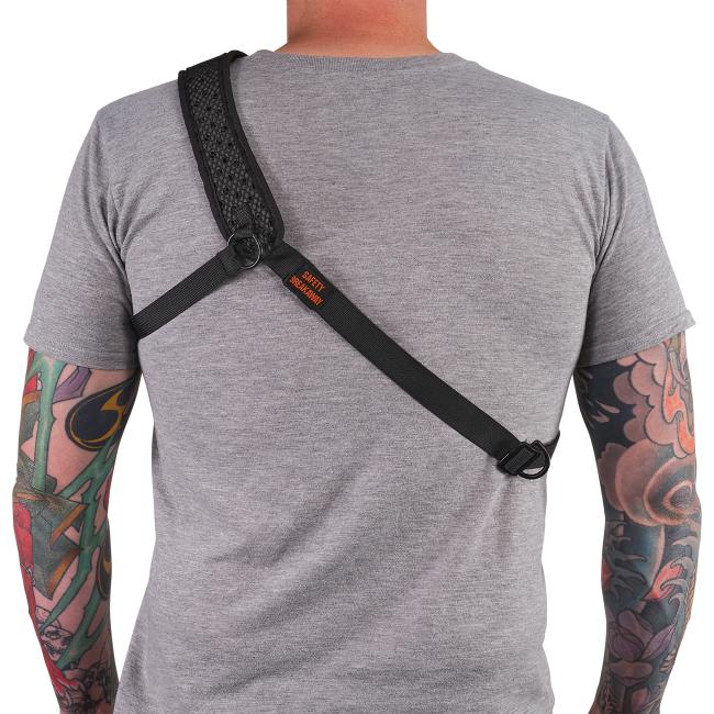Back of breakaway barcode scanner sling lanyard with eva foam padded shoulder on model